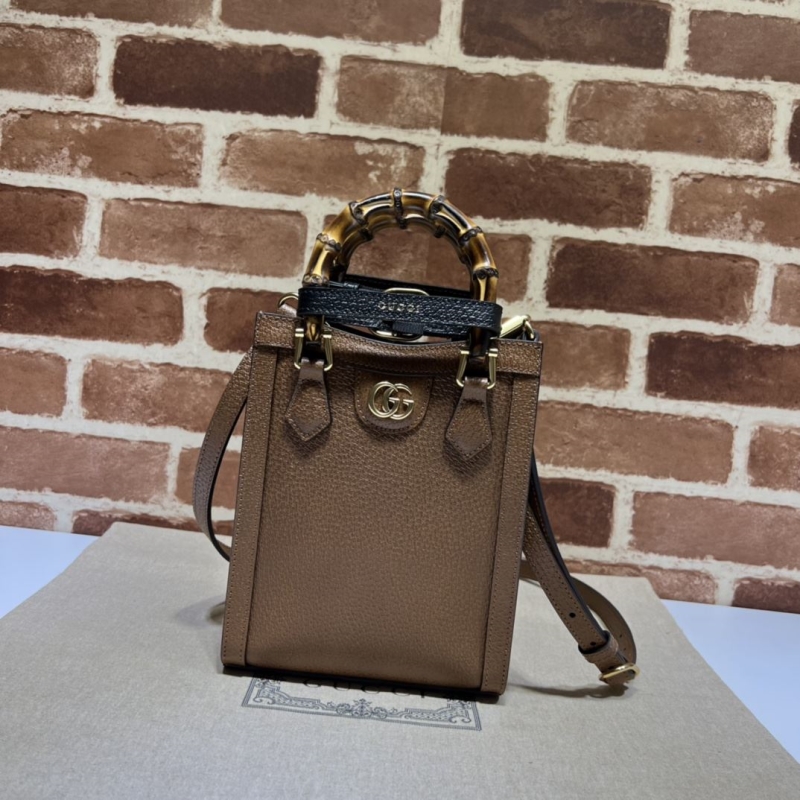 G*u*i top handle bags